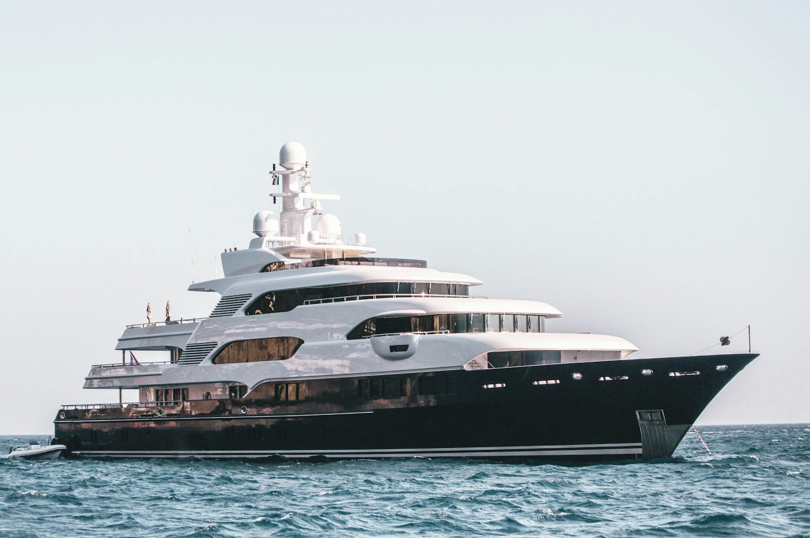 A luxury motor yacht anchored off the Amalfi coast